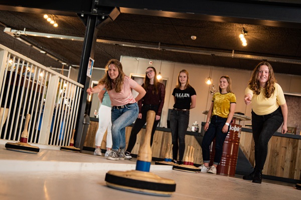 people are playing shuffle board at Family and Entertainment Centre de Ketelfabriek